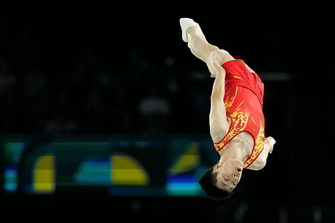Yan Langyu of China competes during men's trampoline finals